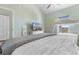 Spacious bedroom with bunk beds, queen size bed, and beach view TV at 3935 Gladiola Ct. # 302, Myrtle Beach, SC 29588
