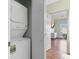 Convenient laundry closet with a stacked washer and dryer right outside the bedroom at 3935 Gladiola Ct. # 302, Myrtle Beach, SC 29588