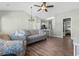 The living area has a couch, chair, and bar seating, and is open to the kitchen at 3935 Gladiola Ct. # 302, Myrtle Beach, SC 29588