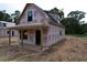 New construction home featuring durable materials and a simple porch design at 402 S Magnolia Ave., Andrews, SC 29510