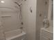 Traditional bathroom with shower and bathtub combo; a clean, functional space at 4083 Sand Trap Ave., Little River, SC 29566