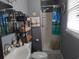 Practical bathroom with a shower, vanity, and ample storage space at 4083 Sand Trap Ave., Little River, SC 29566