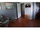 Bright bedroom with wood floors, ample closet space, and stylish furnishings at 4083 Sand Trap Ave., Little River, SC 29566