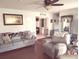 Inviting living room featuring wood floors, neutral tones, and comfortable furnishings at 4083 Sand Trap Ave., Little River, SC 29566