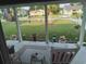 Enjoy the outdoors on this screened porch overlooking a well-manicured lawn at 4083 Sand Trap Ave., Little River, SC 29566