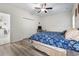 Cozy bedroom featuring a ceiling fan and light colored vinyl flooring at 4331 Grande Harbour Blvd., Little River, SC 29566