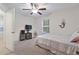 Serene bedroom with a comfortable bed, TV and mermaid decor by a bright window at 4331 Grande Harbour Blvd., Little River, SC 29566