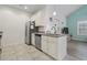 Kitchen features stainless steel appliances, tile flooring and granite countertops at 4331 Grande Harbour Blvd., Little River, SC 29566