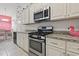 Well-equipped kitchen boasts stainless steel appliances and granite countertops at 4331 Grande Harbour Blvd., Little River, SC 29566