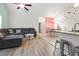 Inviting living area with comfortable seating and a dining area featuring a granite countertop and modern table set at 4331 Grande Harbour Blvd., Little River, SC 29566