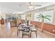 Dining space with seating for four, adjacent to the living area, offering an open and airy feel at 4350 Intercoastal Dr. # 1101, Little River, SC 29566