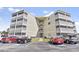 Condominium complex with multiple units and parking spots available in front at 4350 Intercoastal Dr. # 1101, Little River, SC 29566