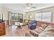 Relaxing living area with a view to the balcony with sliding glass doors that provide plenty of natural light at 4350 Intercoastal Dr. # 1101, Little River, SC 29566