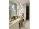 Neutral bathroom featuring a vanity with a large mirror, unique lighting, and a separate toilet at 4447 River Rd., Little River, SC 29566