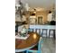 Bright kitchen with a breakfast nook, bar seating, and ample countertop space at 4447 River Rd., Little River, SC 29566