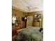 Comfortable bedroom featuring a large mirror and elegant furnishings at 4447 River Rd., Little River, SC 29566