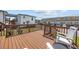 A wood deck with furniture and a view of the complex and parking lot at 4501 N Ocean Blvd., North Myrtle Beach, SC 29582
