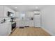 Modern kitchen featuring white cabinets, stainless steel appliances, and lots of counter space at 4501 N Ocean Blvd., North Myrtle Beach, SC 29582