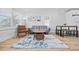 Bright living room with modern furniture, wood laminate flooring, and plenty of natural light at 4501 N Ocean Blvd., North Myrtle Beach, SC 29582