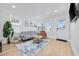 Cozy living room with neutral colors, stylish furnishings, and ample natural light at 4501 N Ocean Blvd., North Myrtle Beach, SC 29582