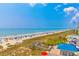 Panoramic view from a balcony of a stunning beach, ocean, and lifeguard stand at 4525 S Ocean Blvd. # 406, North Myrtle Beach, SC 29582