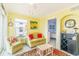 Cozy living room with yellow walls, comfortable seating, and decorative accents at 4525 S Ocean Blvd. # 406, North Myrtle Beach, SC 29582