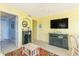 Cozy living room with TV, decor, and multiple entryways, perfect for easy living at 4525 S Ocean Blvd. # 406, North Myrtle Beach, SC 29582