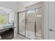Modern tiled walk-in shower in a bathroom with an adjacent bedroom view at 4555 Weekly Dr, Myrtle Beach, SC 29579