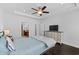 Inviting bedroom with stylish furnishings and a glimpse of the adjoining bathroom at 4555 Weekly Dr, Myrtle Beach, SC 29579