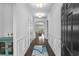Elegant entryway with hardwood floors, wainscoting, and an open view into the living space at 4555 Weekly Dr, Myrtle Beach, SC 29579
