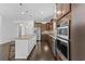 Kitchen showcasing a large island with seating, stainless steel appliances, and abundant counter space at 4555 Weekly Dr, Myrtle Beach, SC 29579