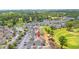 Aerial view of condo buildings with golf course and wooded surroundings at 4705 Wild Iris Dr. # 201, Myrtle Beach, SC 29577