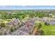 Aerial view of condo buildings with golf course and wooded surroundings at 4705 Wild Iris Dr. # 201, Myrtle Beach, SC 29577