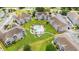 Aerial view of condo community with pool, landscaping and surrounding buildings at 4705 Wild Iris Dr. # 201, Myrtle Beach, SC 29577