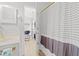 Clean bathroom with a shower and view into the other rooms at 4705 Wild Iris Dr. # 201, Myrtle Beach, SC 29577