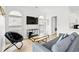 Modern living room with contemporary furnishings, ample lighting, and neutral tones at 4705 Wild Iris Dr. # 201, Myrtle Beach, SC 29577