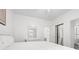 Large main bedroom features a white dresser, bathroom, and closet at 4705 Wild Iris Dr. # 201, Myrtle Beach, SC 29577