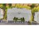 Aerial of complex with ample parking and well-manicured landscaping and rooftop details at 4878 Luster Leaf Circle # 102, Myrtle Beach, SC 29577