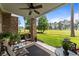 Inviting back porch with comfortable seating and a view of the golf course at 4878 Luster Leaf Circle # 102, Myrtle Beach, SC 29577