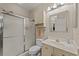 Well-maintained bathroom with a glass-door shower, vanity, and coordinated fixtures at 4878 Luster Leaf Circle # 102, Myrtle Beach, SC 29577