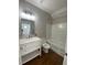 Modern bathroom with marble vanity top, stylish fixtures, and tiled shower/tub at 493 Emerson Dr., Myrtle Beach, SC 29579