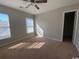 Bedroom with two large windows and neutral walls allows for plenty of natural light and comfort at 493 Emerson Dr., Myrtle Beach, SC 29579