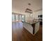 Contemporary kitchen with a large island, stainless steel appliances, and hardwood floors at 493 Emerson Dr., Myrtle Beach, SC 29579