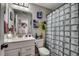 Bathroom featuring a single vanity, toilet, and a bathtub with a glass block shower curtain at 5013 Sassari St., Myrtle Beach, SC 29579