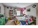 Eclectic bedroom with a bright color scheme, playful decor, and ample natural light at 5013 Sassari St., Myrtle Beach, SC 29579