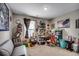 This well-lit office includes a sofa, desk, shelves, and decor at 5013 Sassari St., Myrtle Beach, SC 29579