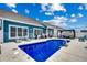 The backyard features a sparkling pool, a patio area, and a pergola at 5013 Sassari St., Myrtle Beach, SC 29579
