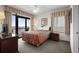 Bedroom featuring a comfortable bed, and sliding glass doors to the balcony at 5310 N Ocean Blvd. # Ph 6 1506, Myrtle Beach, SC 29577