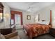 Bedroom featuring a comfortable bed, dresser with mirror, and a ceiling fan at 5310 N Ocean Blvd. # Ph 6 1506, Myrtle Beach, SC 29577