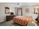 Bedroom featuring a comfortable bed, dresser with mirror, and a ceiling fan at 5310 N Ocean Blvd. # Ph 6 1506, Myrtle Beach, SC 29577